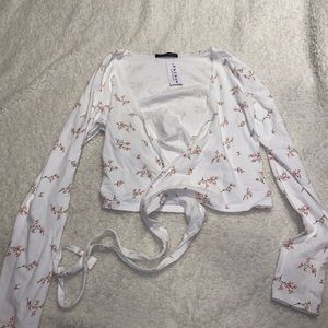 Brandy long sleeve wrap top!